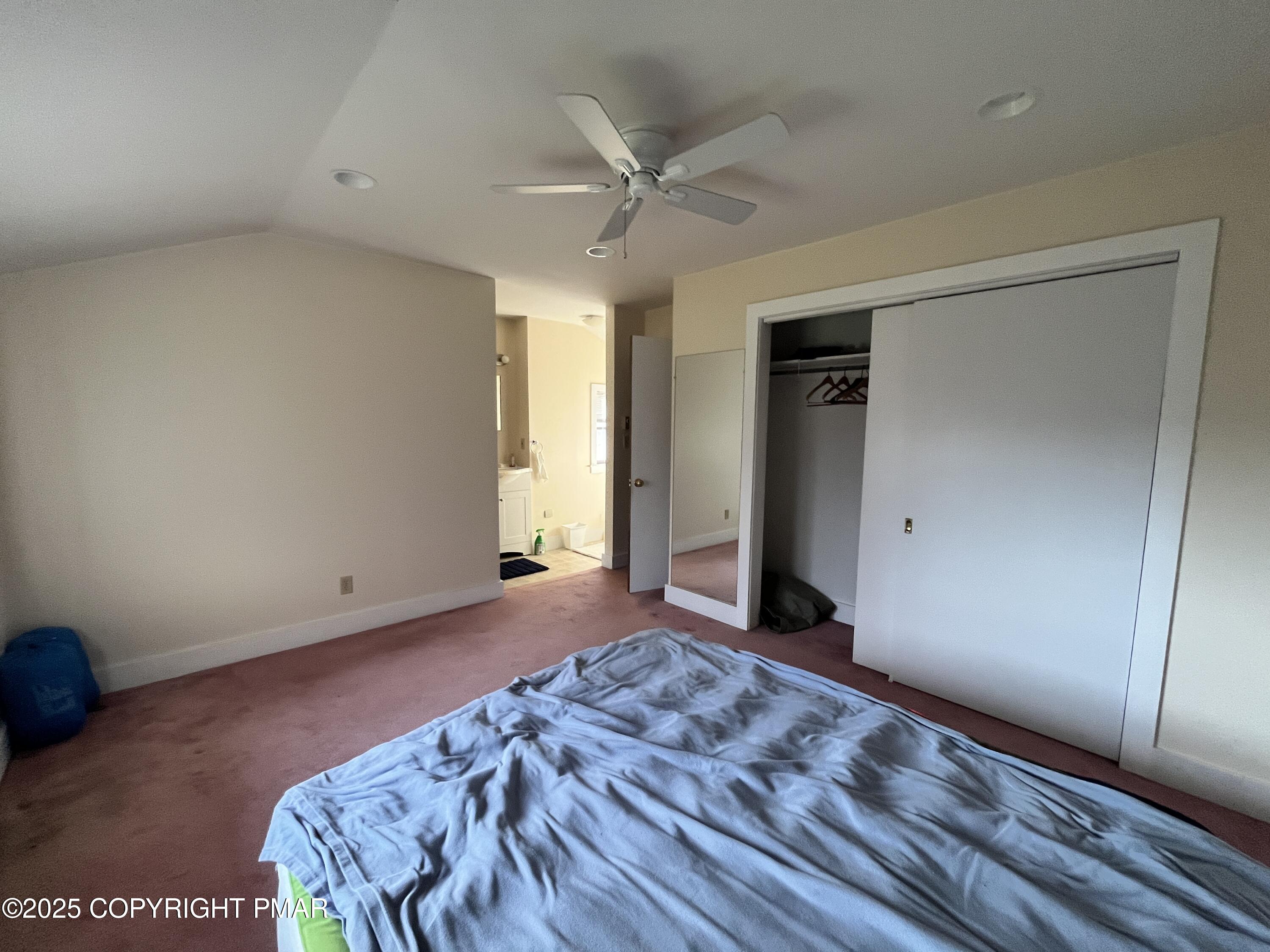 1970 Aberdeen Road Moscow, PA 18444 - Photo 23 of 45 a view of a livingroom with a hardwood floor and a ceiling fan