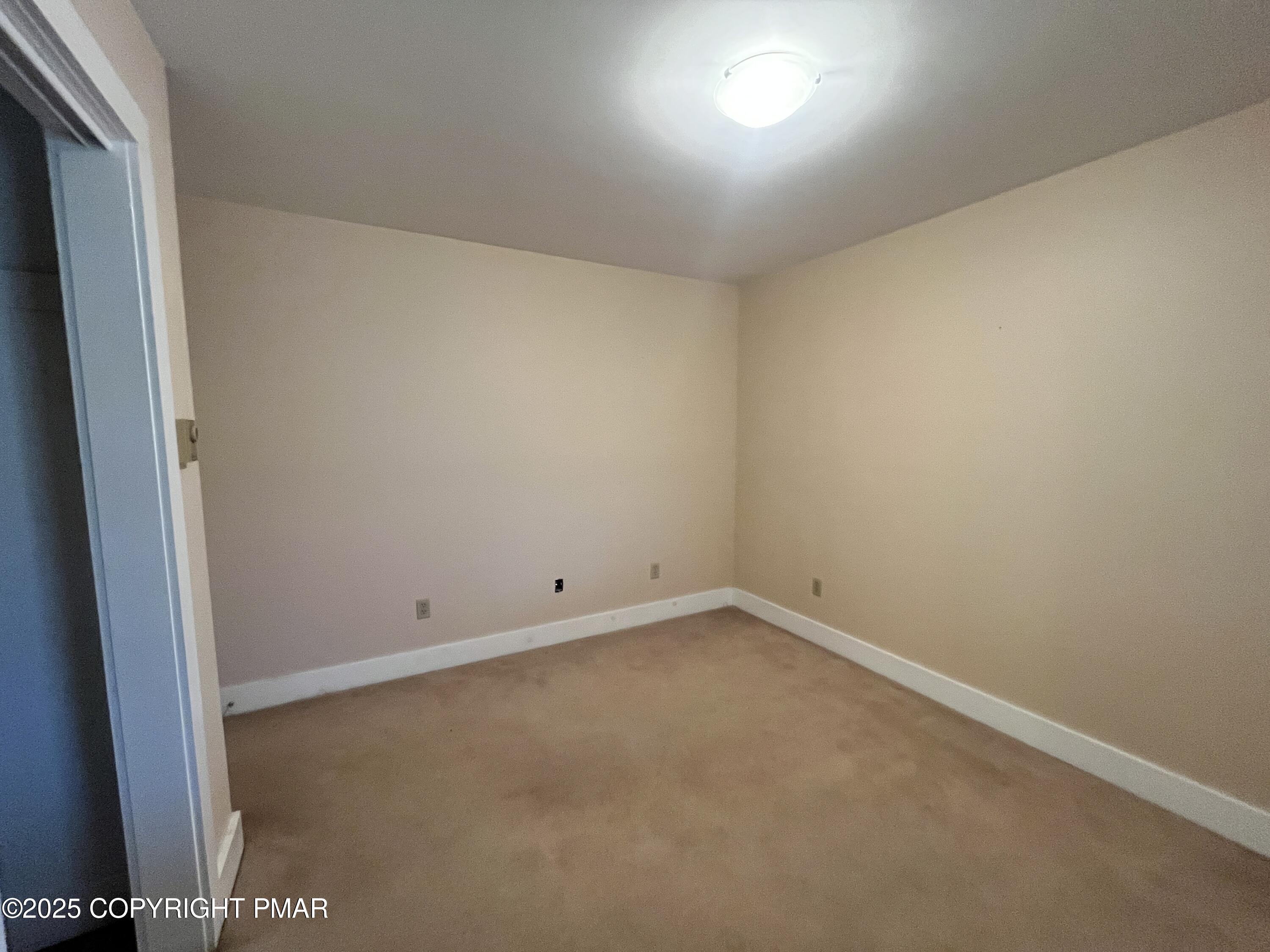 1970 Aberdeen Road Moscow, PA 18444 - Photo 30 of 45 an empty room with a bench