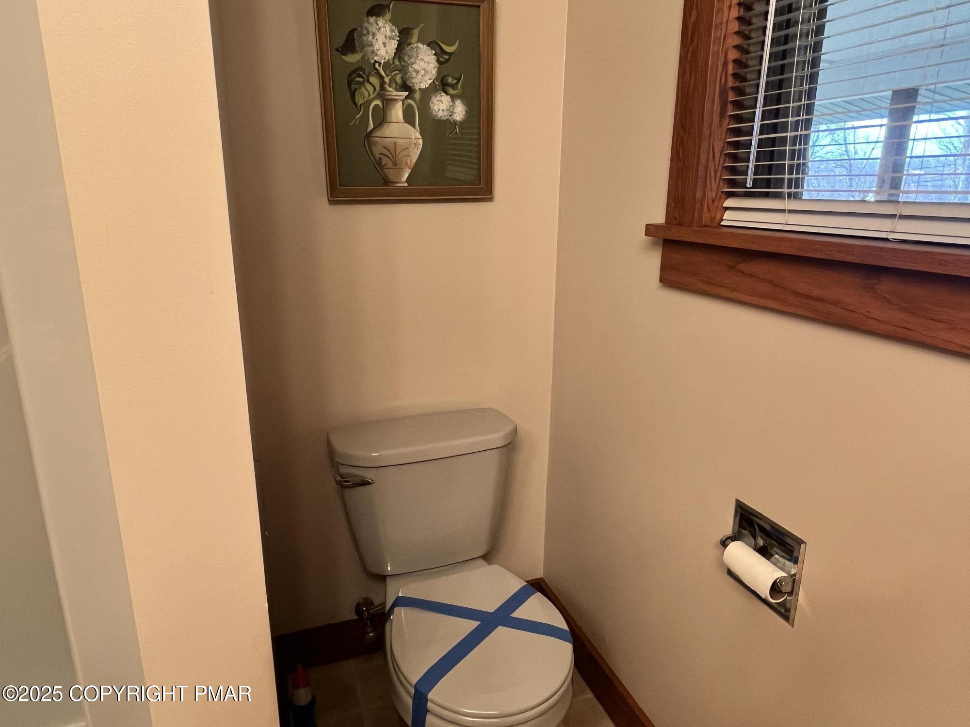 1970 Aberdeen Road Moscow, PA 18444 - Photo 32 of 45 a white toilet sitting next to a window