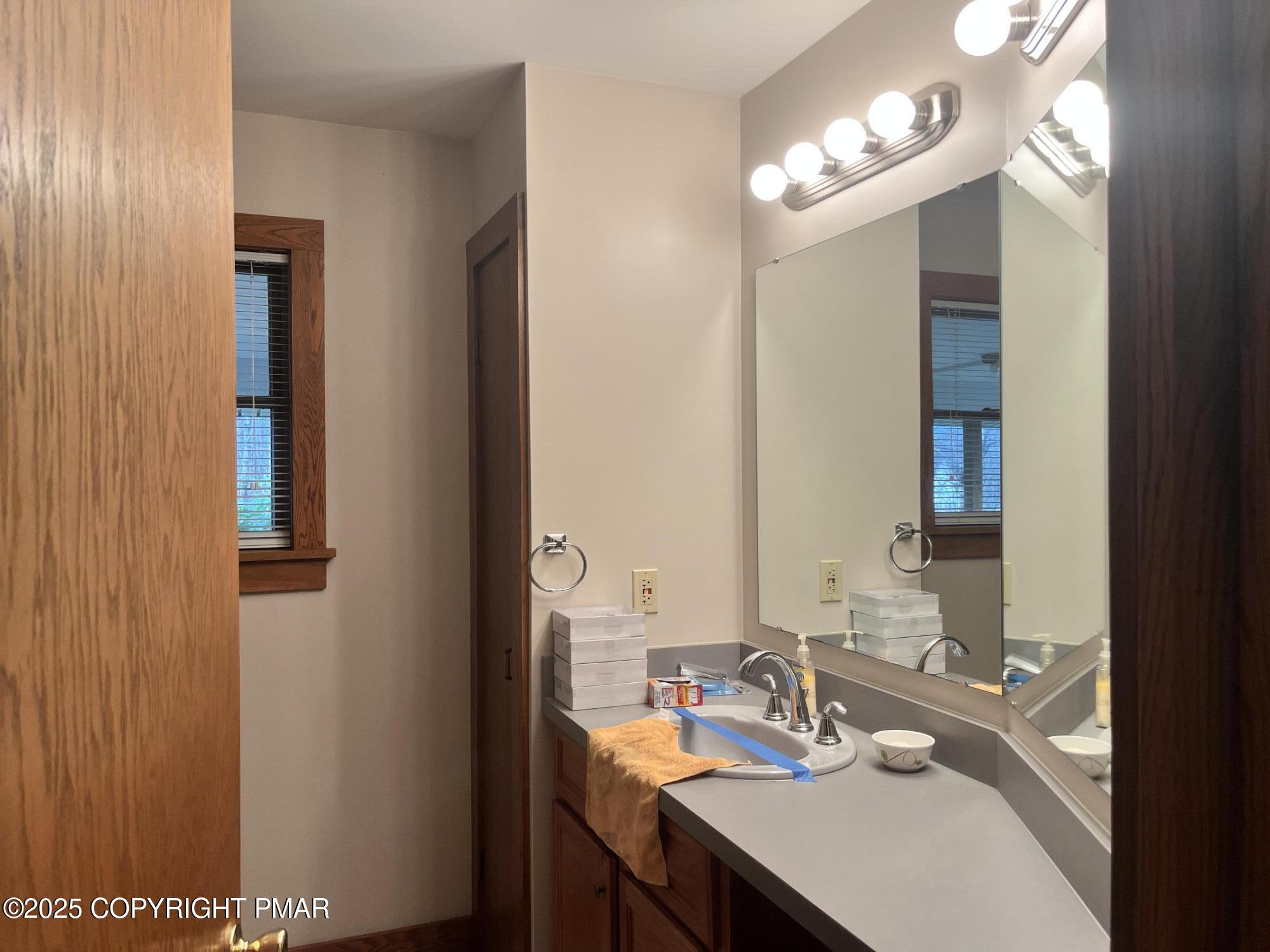 1970 Aberdeen Road Moscow, PA 18444 - Photo 33 of 44 a bathroom with a sink and a mirror