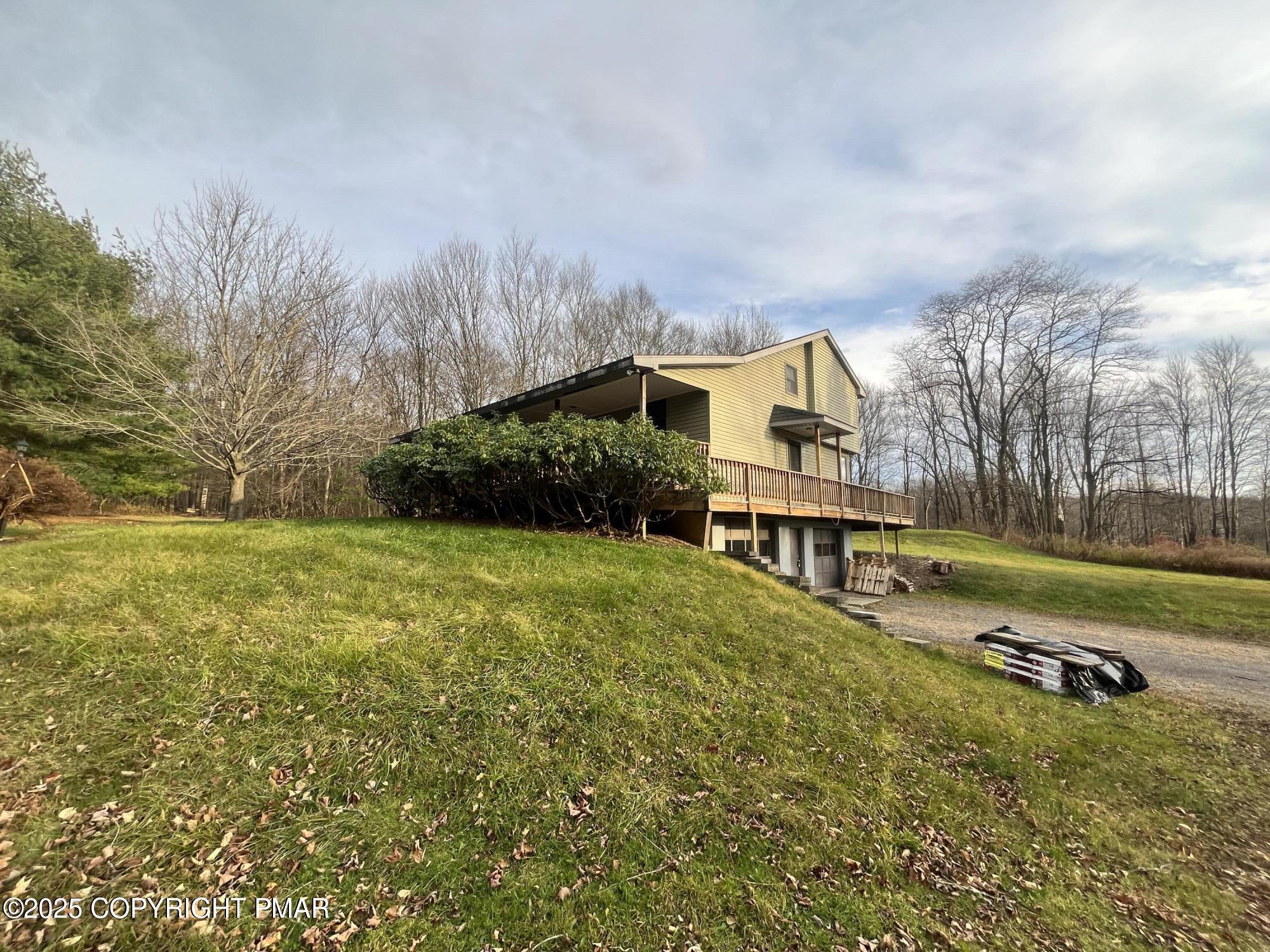 1970 Aberdeen Road Moscow, PA 18444 - Photo 10 of 45 a view of backyard with swimming pool and green space