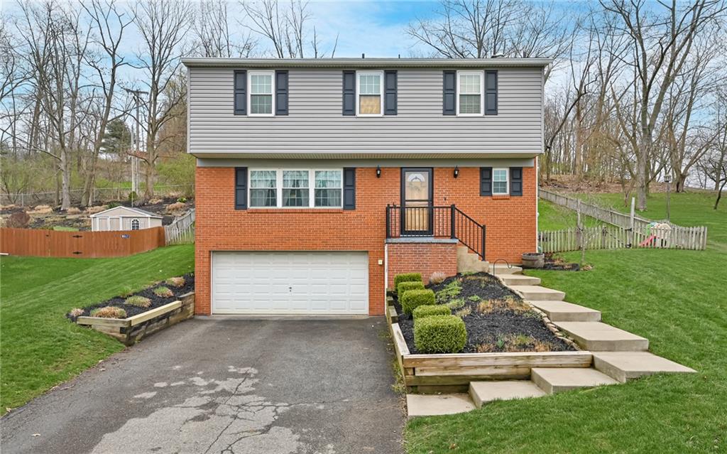 8988 Willoughby Road Pittsburgh, PA 15237 - Photo 1 of 25 front view of a house with a yard