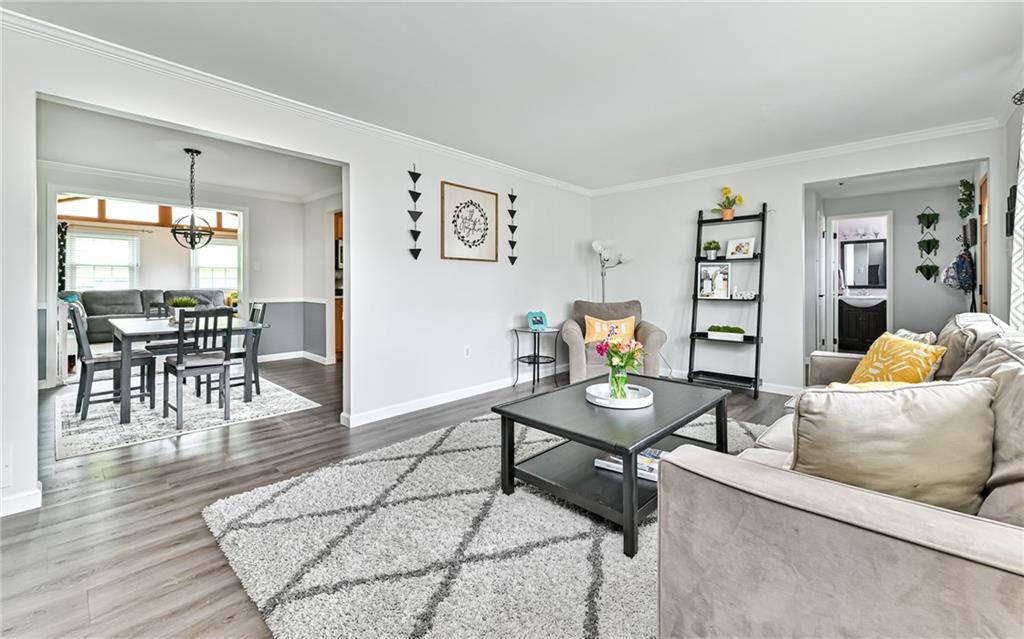 8988 Willoughby Road Pittsburgh, PA 15237 - Photo 13 of 25 a living room with furniture and wooden floor