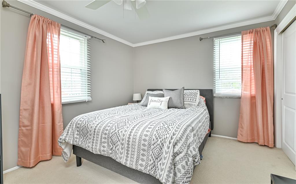 8988 Willoughby Road Pittsburgh, PA 15237 - Photo 21 of 25 a bedroom with a bed and window