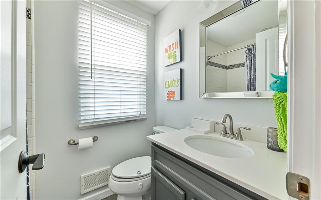 8988 Willoughby Road Pittsburgh, PA 15237 - Photo 22 of 25 a bathroom with a sink and a toilet
