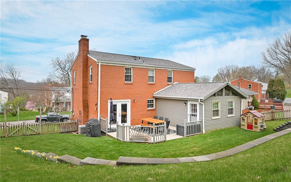 8988 Willoughby Road Pittsburgh, PA 15237 - Photo 25 of 25 a front view of a house with a yard table and chairs