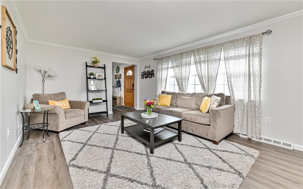 8988 Willoughby Road Pittsburgh, PA 15237 - Photo 4 of 25 a living room with furniture and a wooden floor