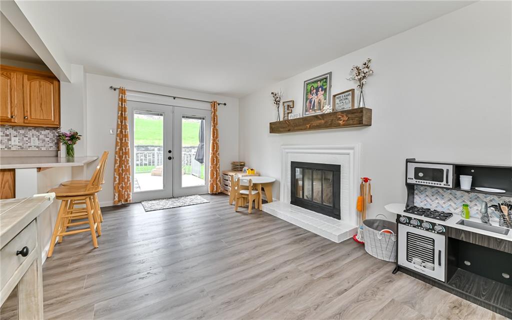 8988 Willoughby Road Pittsburgh, PA 15237 - Photo 8 of 25 a living room with furniture and a fireplace