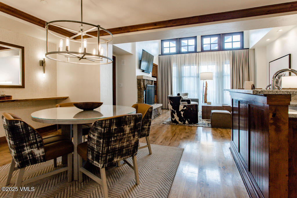 100 Bachelor Ridge Road, Unit 3404/8 Avon, CO 81620 - Photo 2 of 15 a view of a dining room with furniture