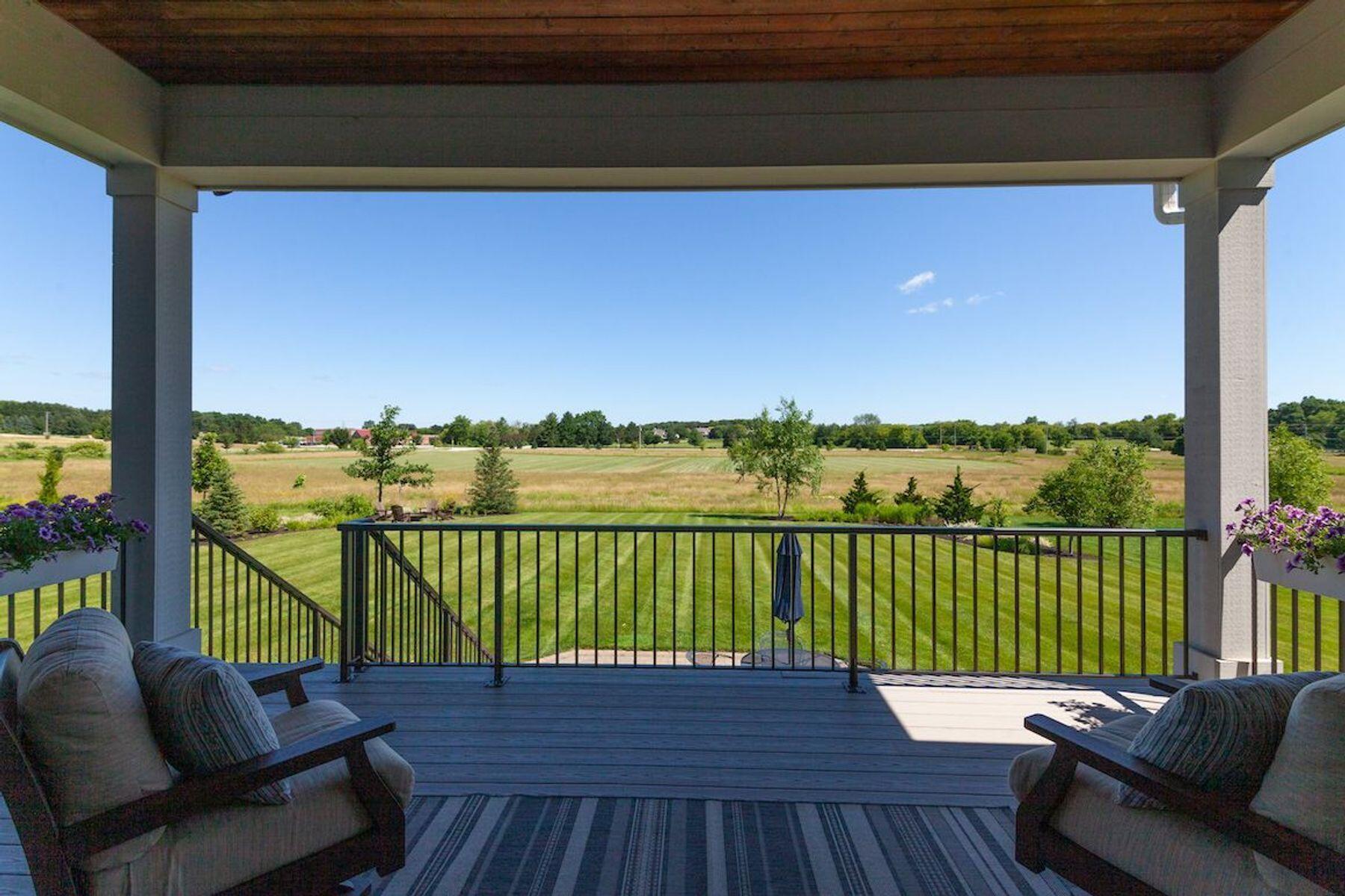 N33W29424 Millridge Road Delafield, WI 53072 - Photo 2 of 60 Covered Deck Overlooks Nature Preserve