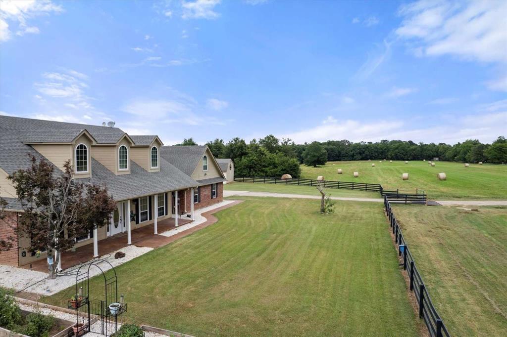 274 County Road Southwest Winnsboro, TX 75494 - Photo 4 of 26 a view of an outdoor space and swimming pool