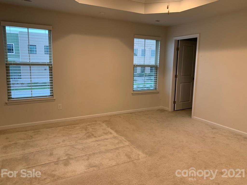 733 Dynamo Street Northwest Concord, NC 28027 - Photo 12 of 24 a view of an empty room with a window