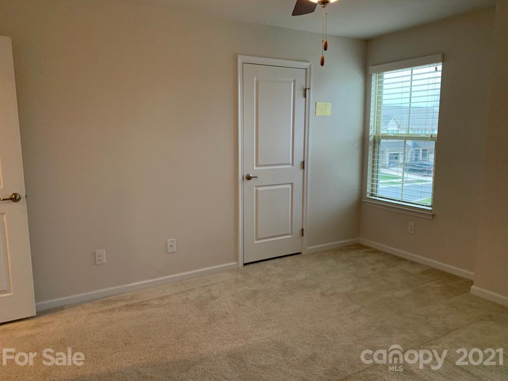 733 Dynamo Street Northwest Concord, NC 28027 - Photo 20 of 24 an empty room with windows