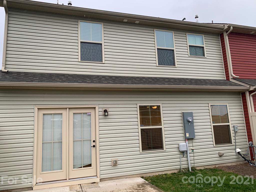 733 Dynamo Street Northwest Concord, NC 28027 - Photo 23 of 24 a view of a house with more windows and brick walls