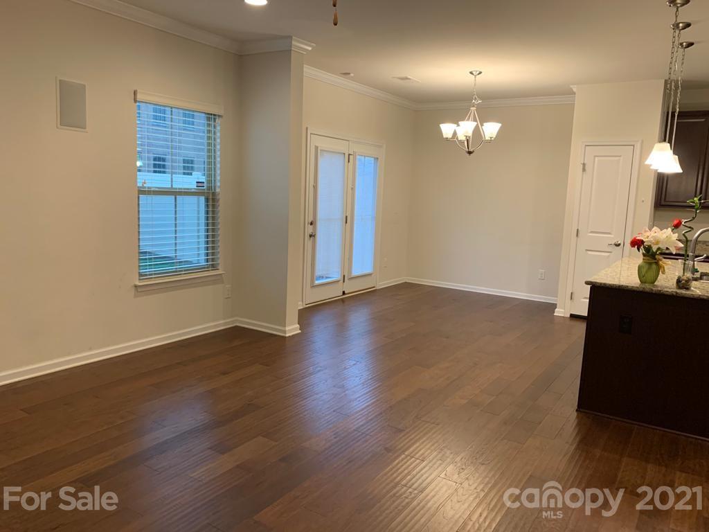 733 Dynamo Street Northwest Concord, NC 28027 - Photo 8 of 24 a view of livingroom with hardwood floor