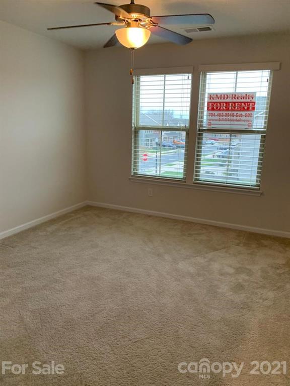 733 Dynamo Street Northwest Concord, NC 28027 - Photo 10 of 24 a view of an empty room with a window