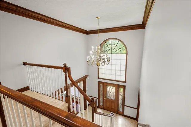 a view of hall way with furniture