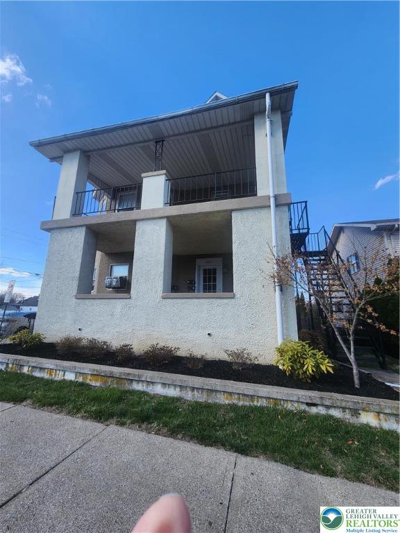 401 East Goepp Street, Unit 2 Bethlehem, PA 18018 - Photo 2 of 16 a house with trees in the background