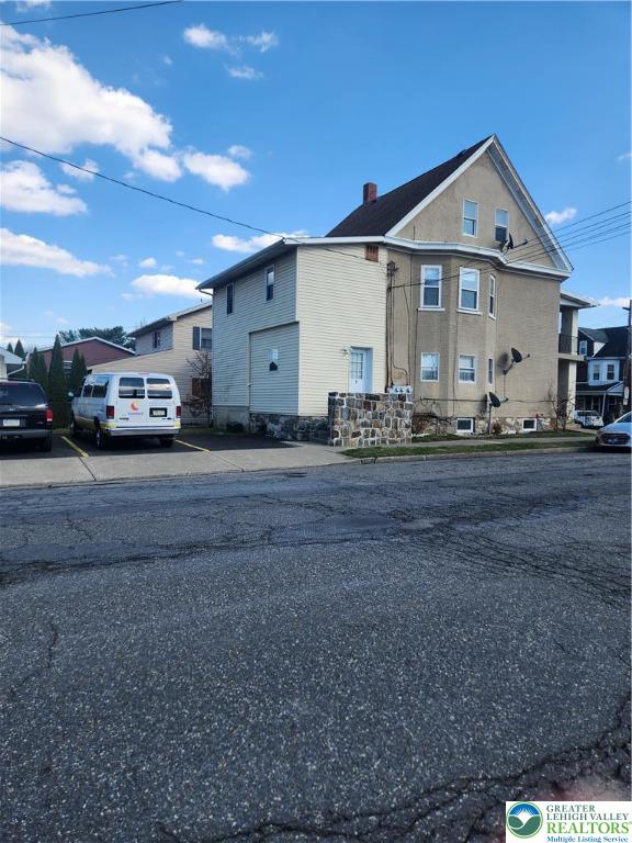 401 East Goepp Street, Unit 2 Bethlehem, PA 18018 - Photo 6 of 16 a front view of a house with a yard