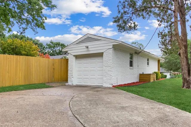 a view of a backyard with a garden