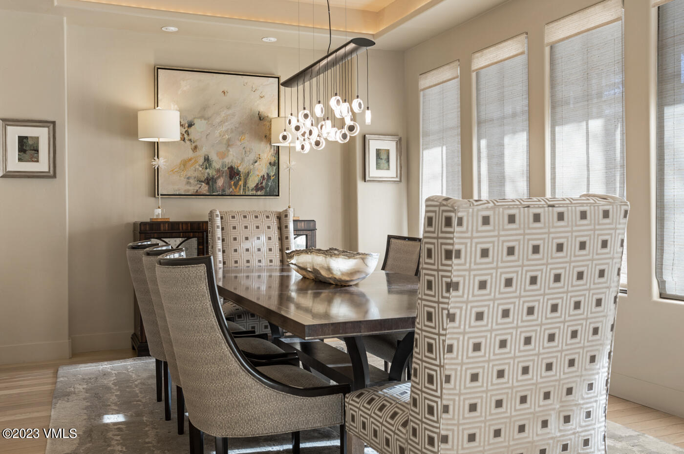 83 Eagle River Road Edwards, CO 81632 - Photo 20 of 64 a view of a dining room with furniture and chandelier