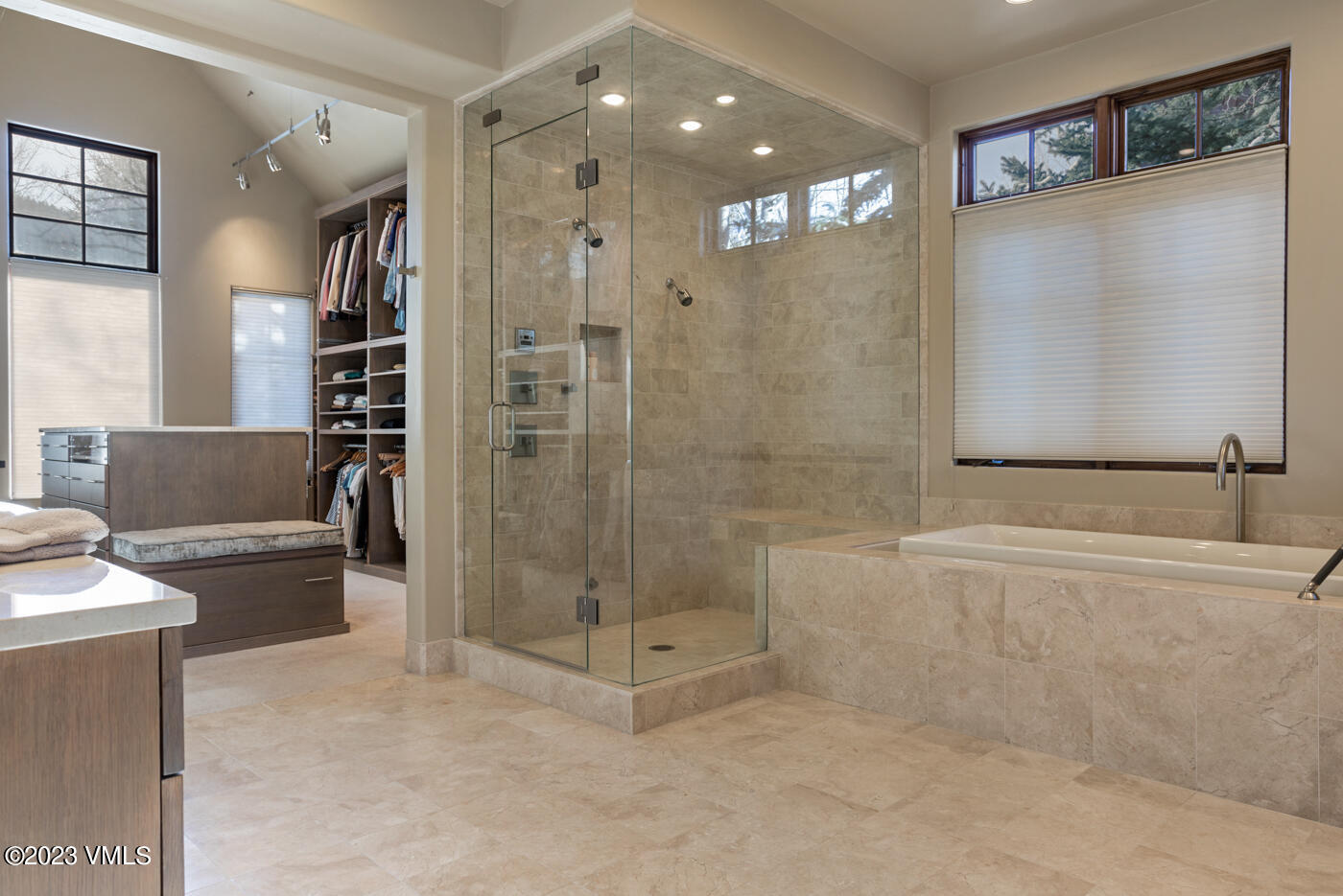 83 Eagle River Road Edwards, CO 81632 - Photo 25 of 64 a bathroom with a shower and a mirror