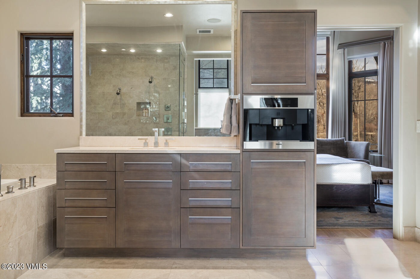 83 Eagle River Road Edwards, CO 81632 - Photo 26 of 64 a bathroom with a sink and a mirror