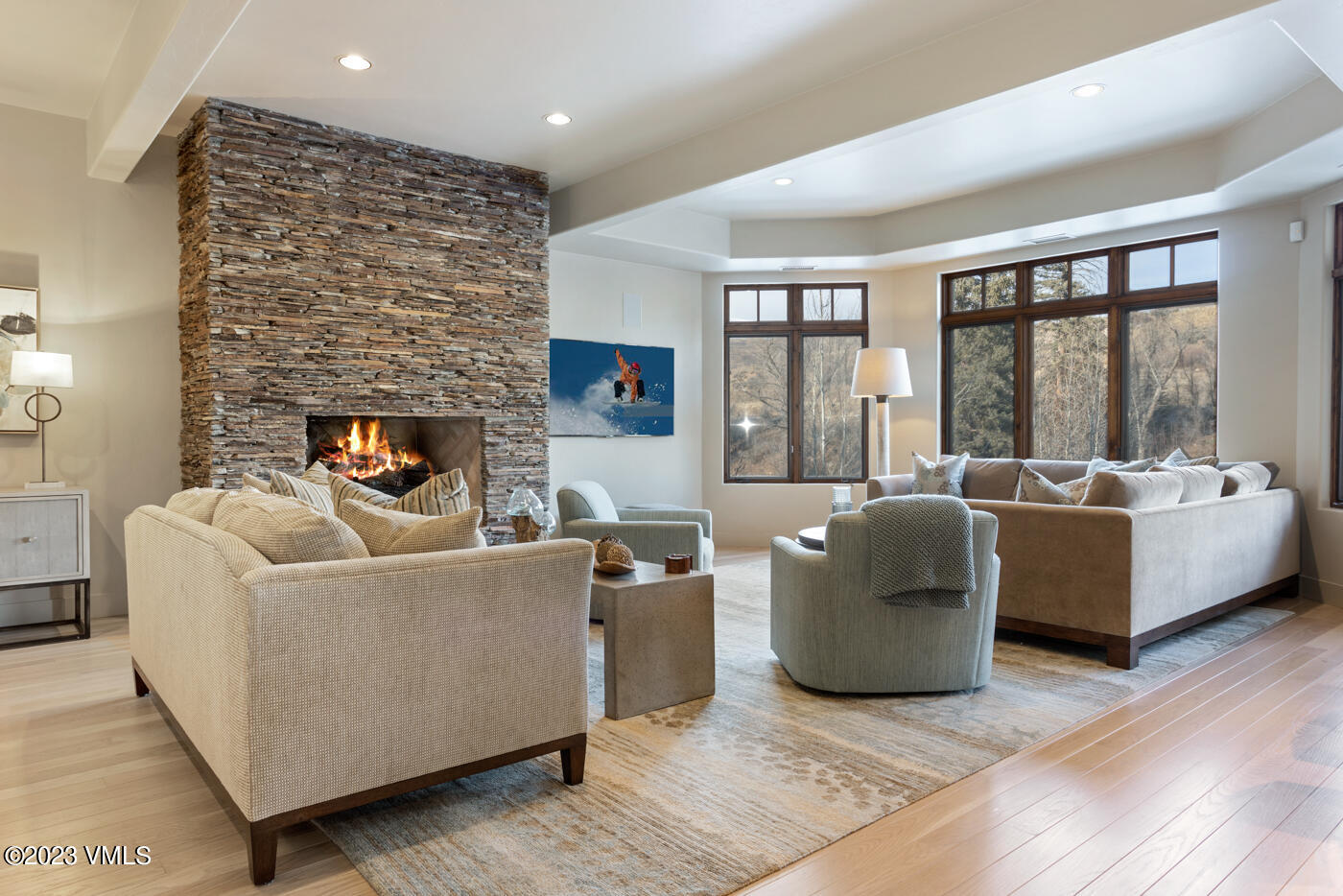 83 Eagle River Road Edwards, CO 81632 - Photo 31 of 64 a living room with furniture and a fireplace