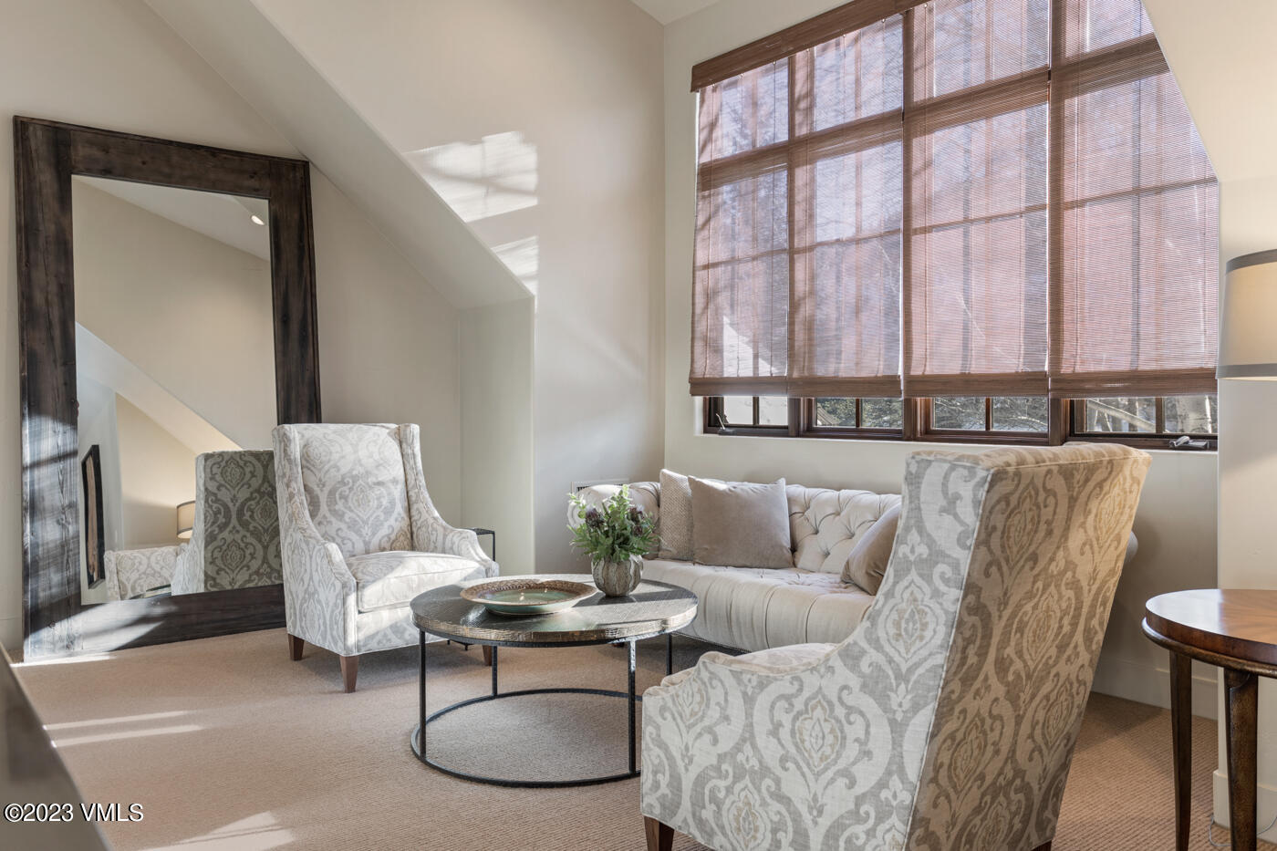 83 Eagle River Road Edwards, CO 81632 - Photo 44 of 64 a living room with furniture and a large window