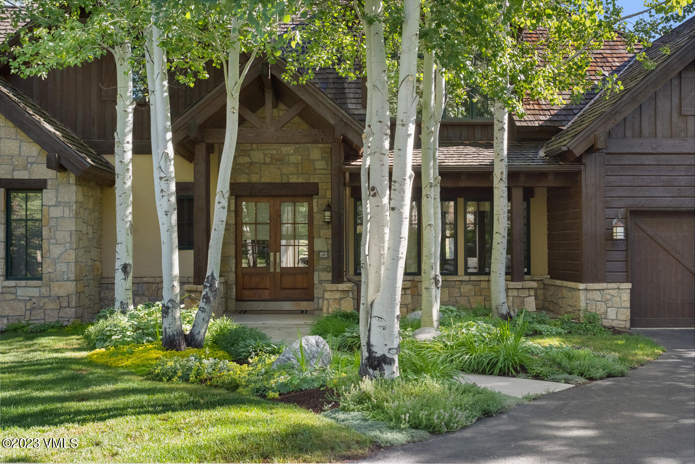 83 Eagle River Road Edwards, CO 81632 - Photo 53 of 64 front view of a house with a yard