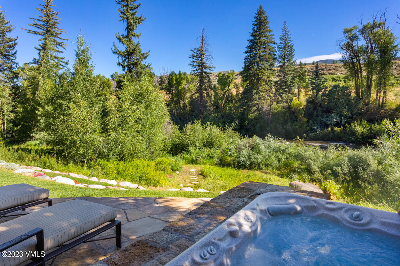 83 Eagle River Road Edwards, CO 81632 - Photo 56 of 64 a view of a yard with plants
