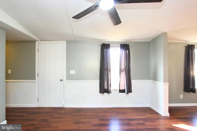 a view of entryway with wooden floor