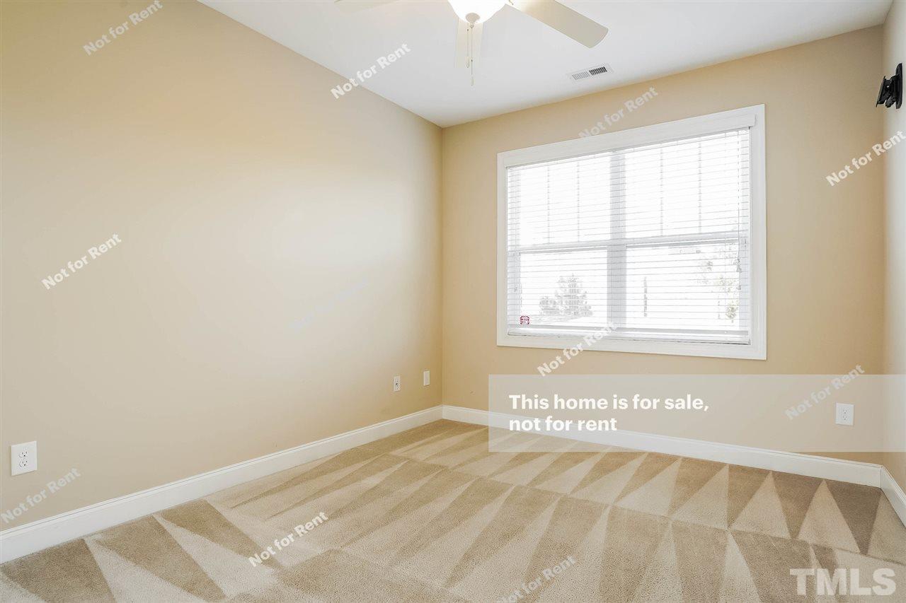 7549 Channery Way Raleigh, NC 27616 - Photo 19 of 27 a view of a room with a window