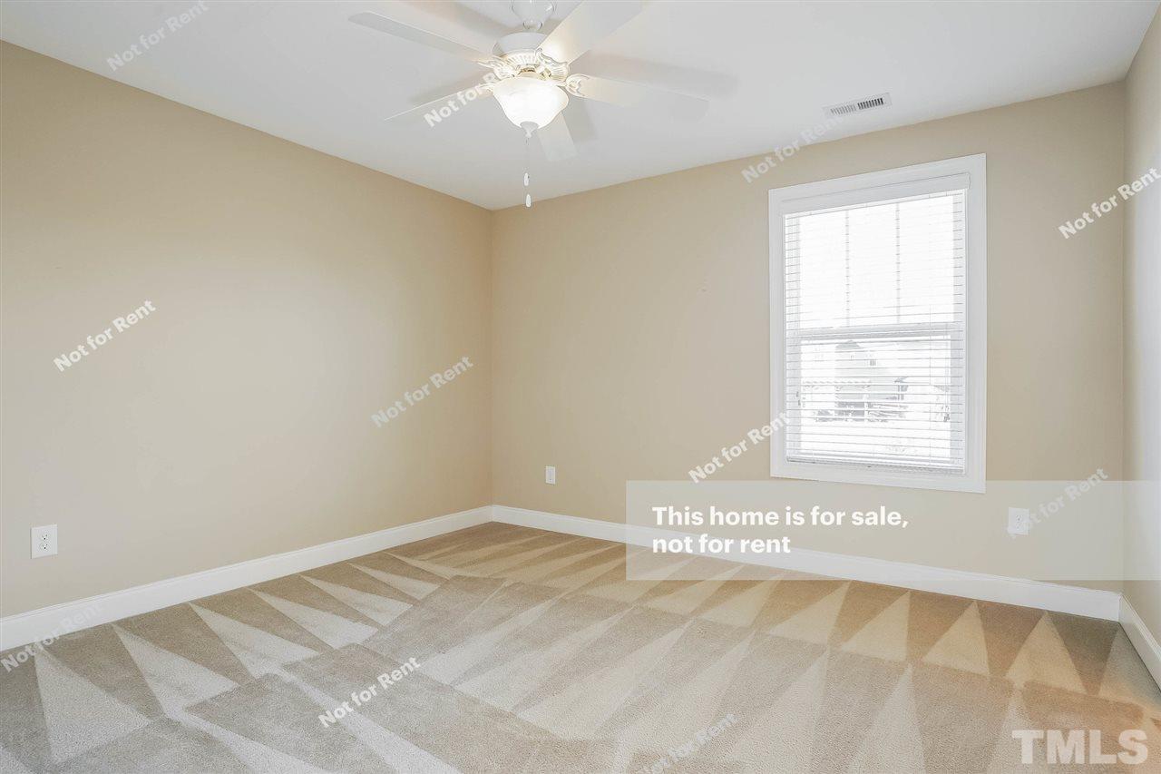 7549 Channery Way Raleigh, NC 27616 - Photo 21 of 27 a view of an empty room and window