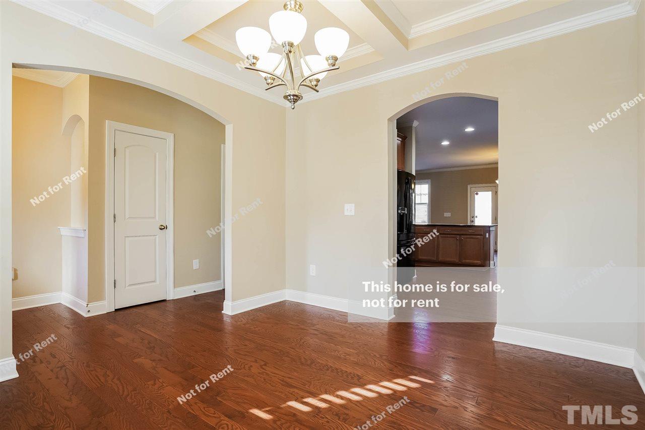 7549 Channery Way Raleigh, NC 27616 - Photo 10 of 27 a view of a livingroom with a furniture