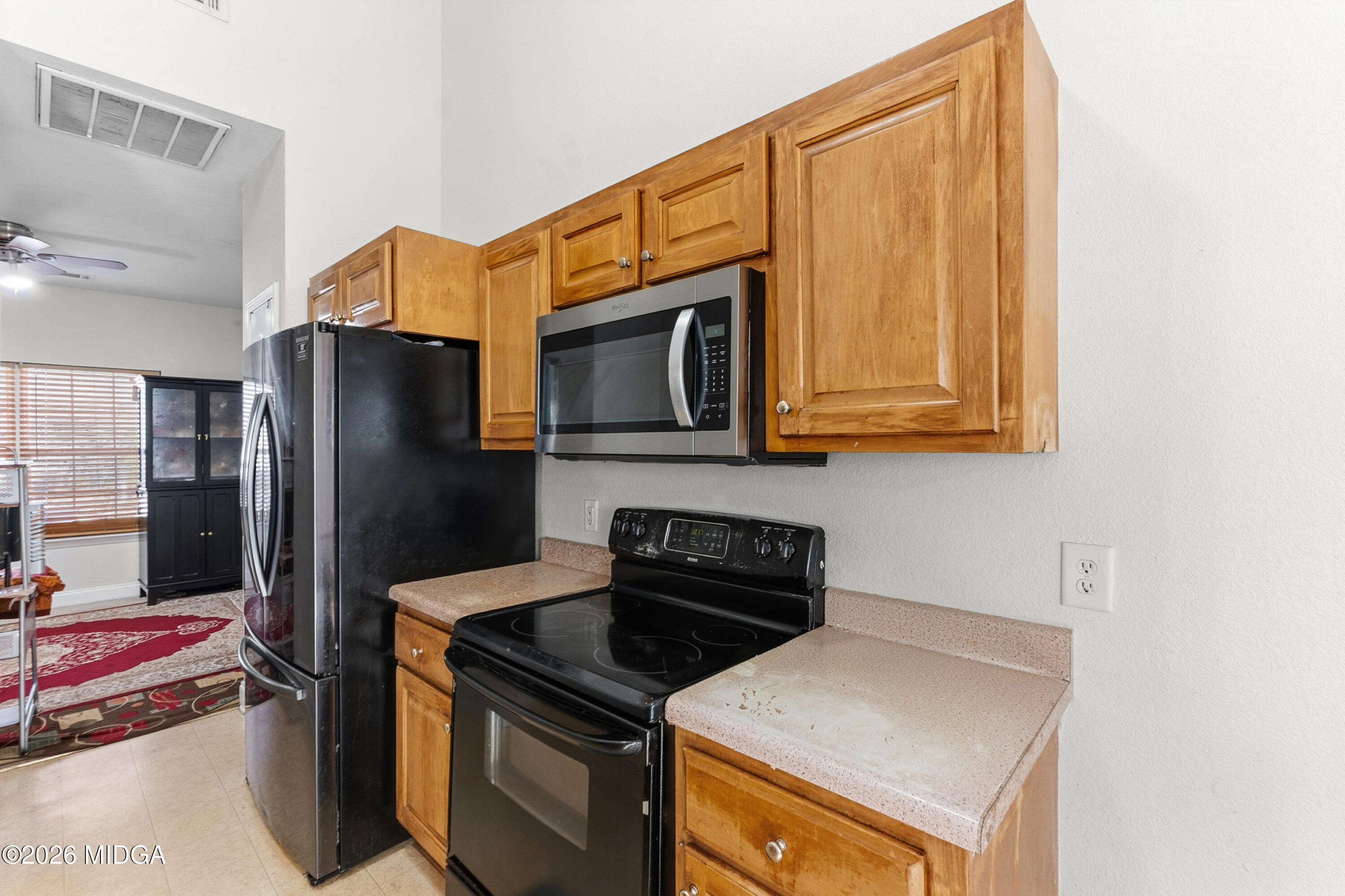 106 Shiloh Court Macon, GA 31206 - Photo 11 of 46 a kitchen with stainless steel appliances granite countertop a refrigerator and a stove top oven