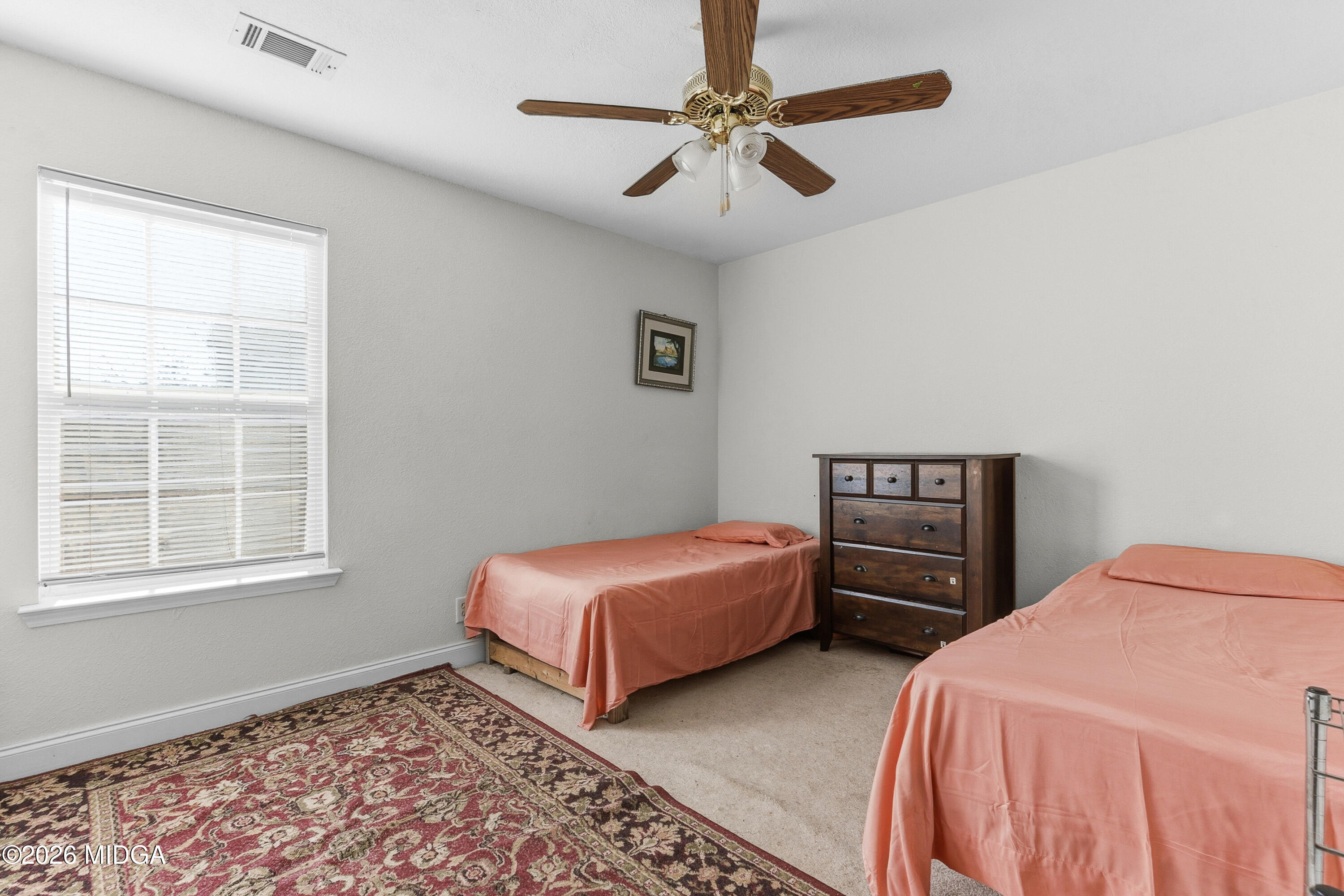 106 Shiloh Court Macon, GA 31206 - Photo 29 of 46 a bedroom with two beds and a window