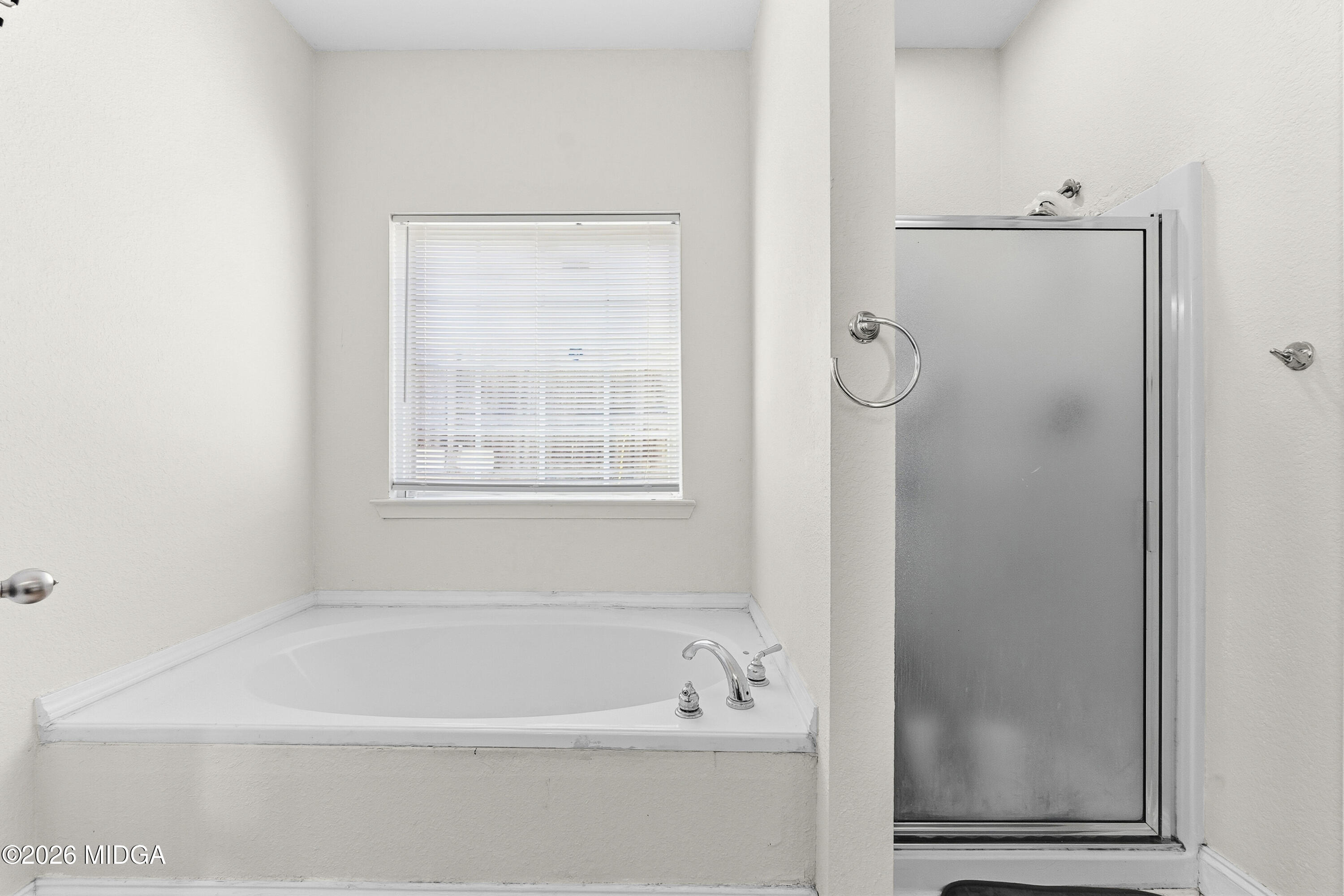 106 Shiloh Court Macon, GA 31206 - Photo 34 of 46 a bathroom with a bathtub and a shower