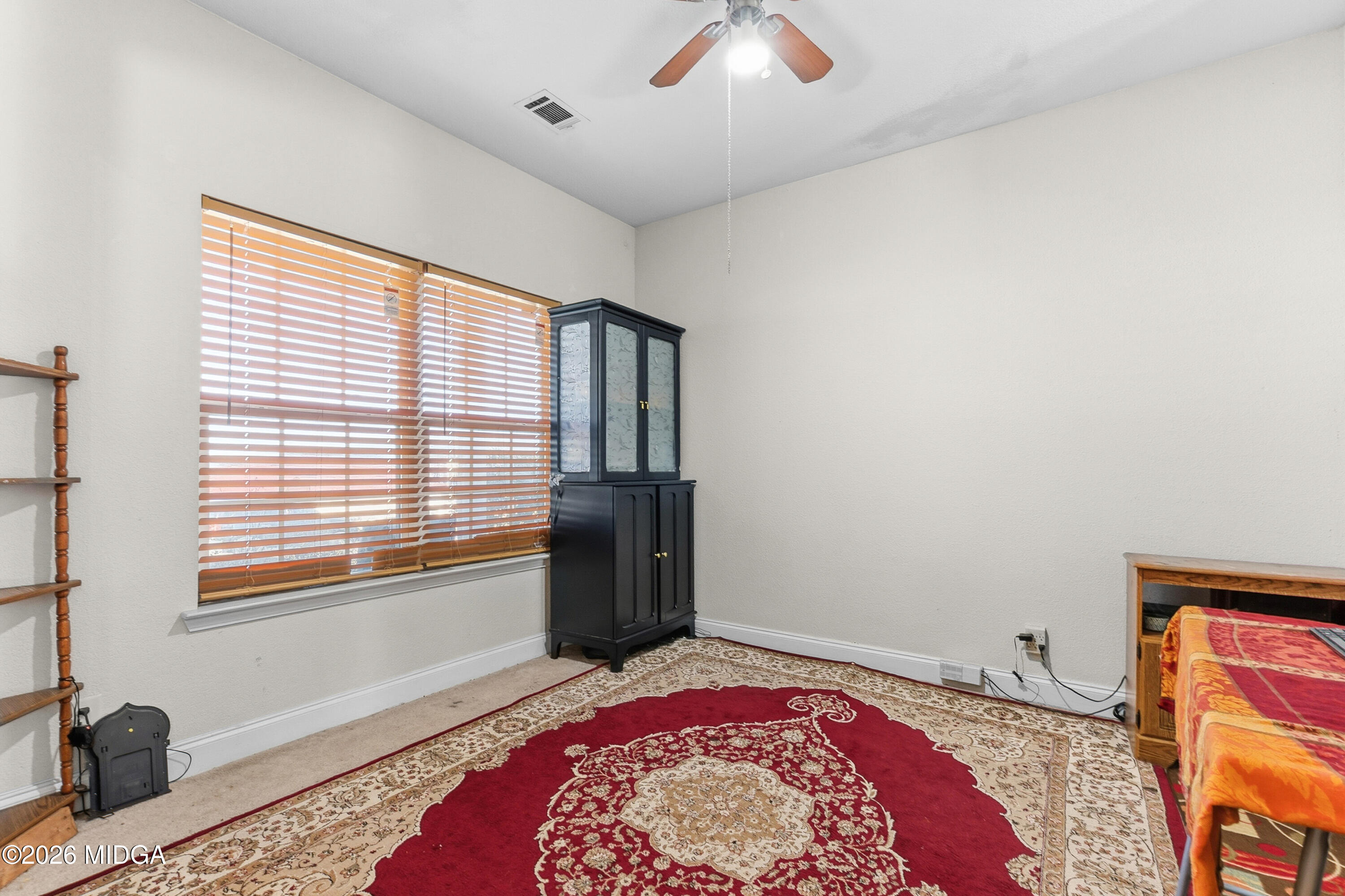 106 Shiloh Court Macon, GA 31206 - Photo 5 of 46 a bedroom with a bed and a window