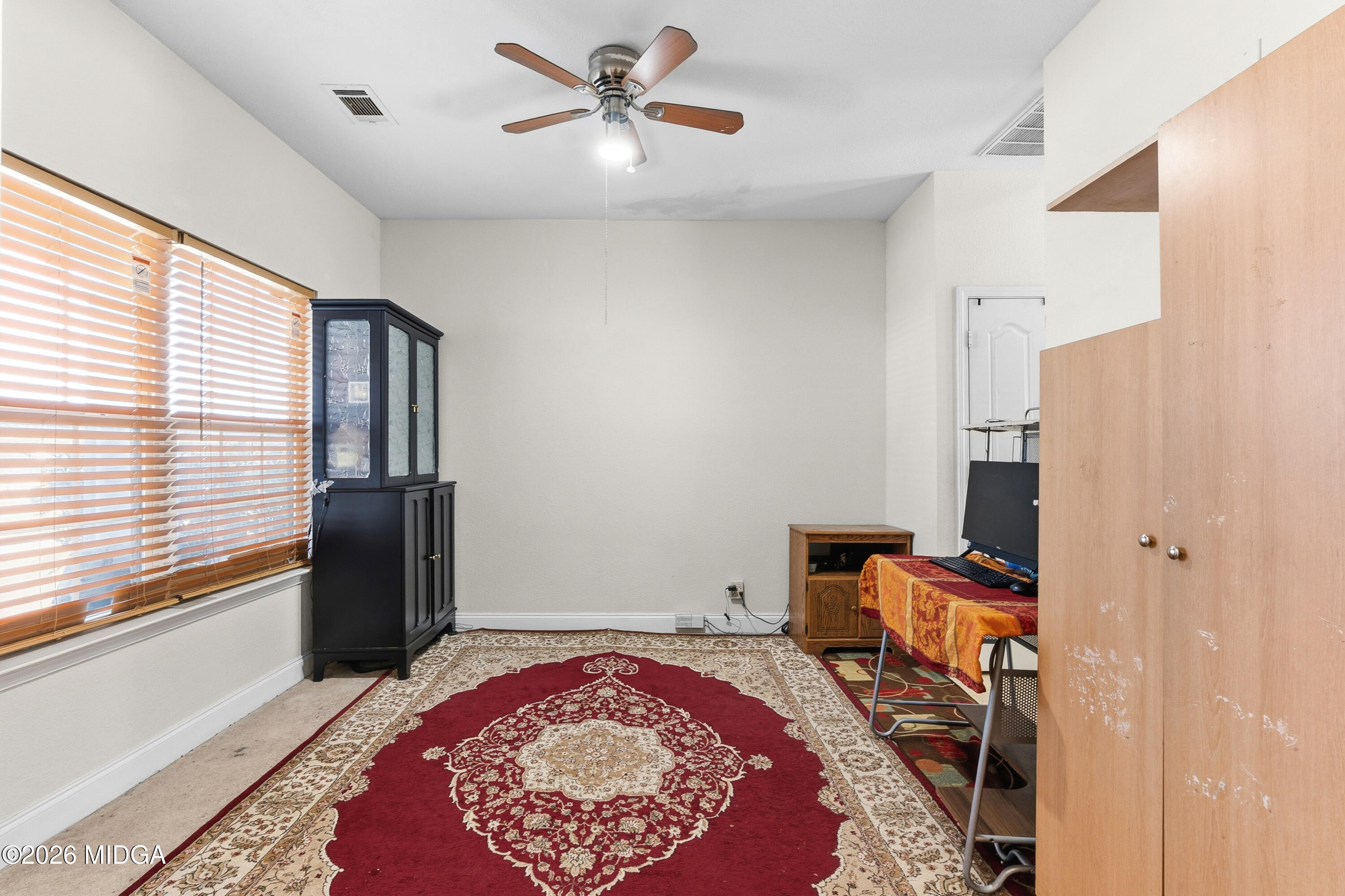 106 Shiloh Court Macon, GA 31206 - Photo 6 of 46 a bedroom with a bed and wooden floor