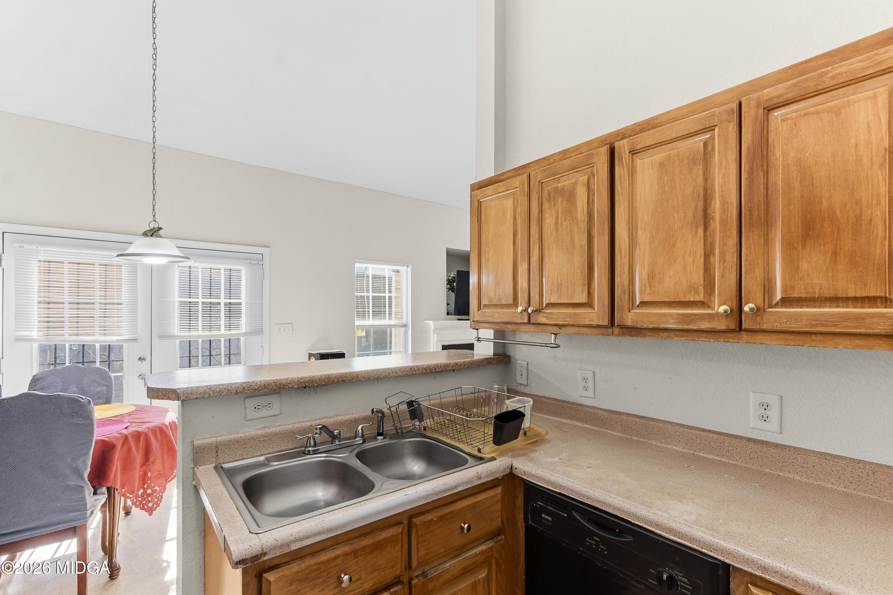 106 Shiloh Court Macon, GA 31206 - Photo 7 of 46 a kitchen with a sink and cabinets