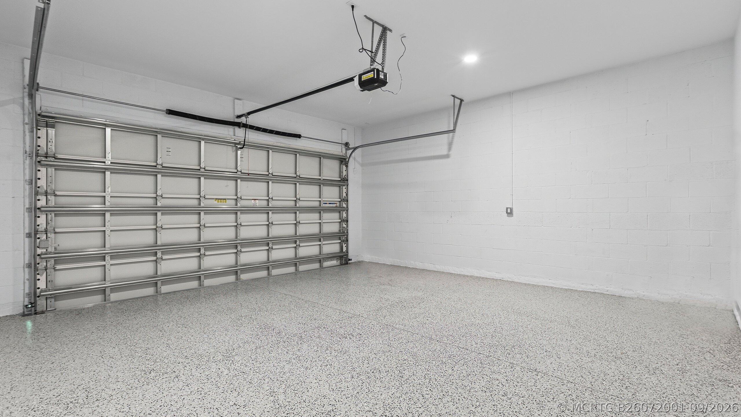 7999 Southwest Andrea Way Port St. Lucie, FL 34987 - Photo 27 of 64 Garage