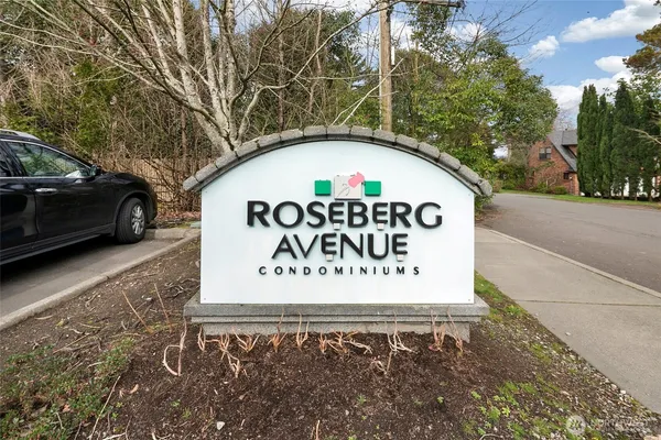 a sign broad on the side of a road
