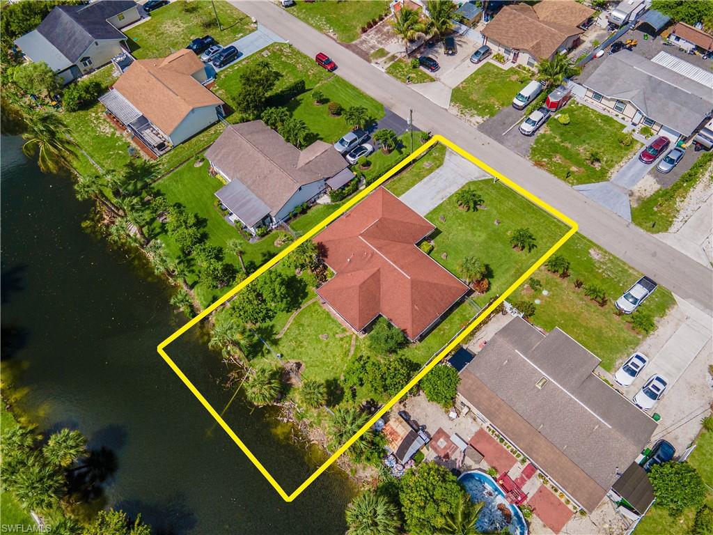2100 55th Street Southwest Naples, FL 34116 - Photo 6 of 50 an aerial view of a house