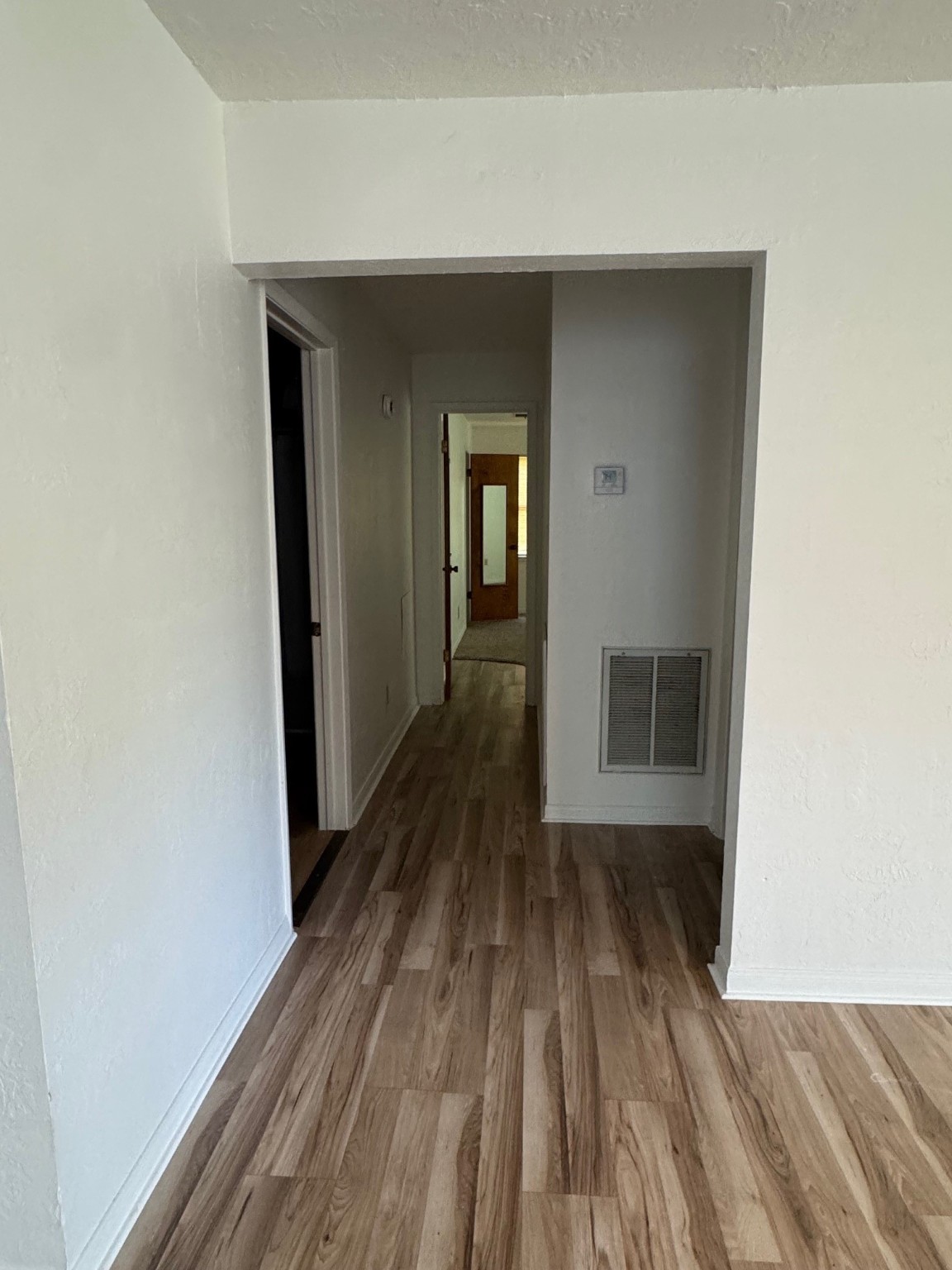 18121 Atkinson Lane Conroe, TX 77384 - Photo 19 of 29 a view of a room with wooden floor
