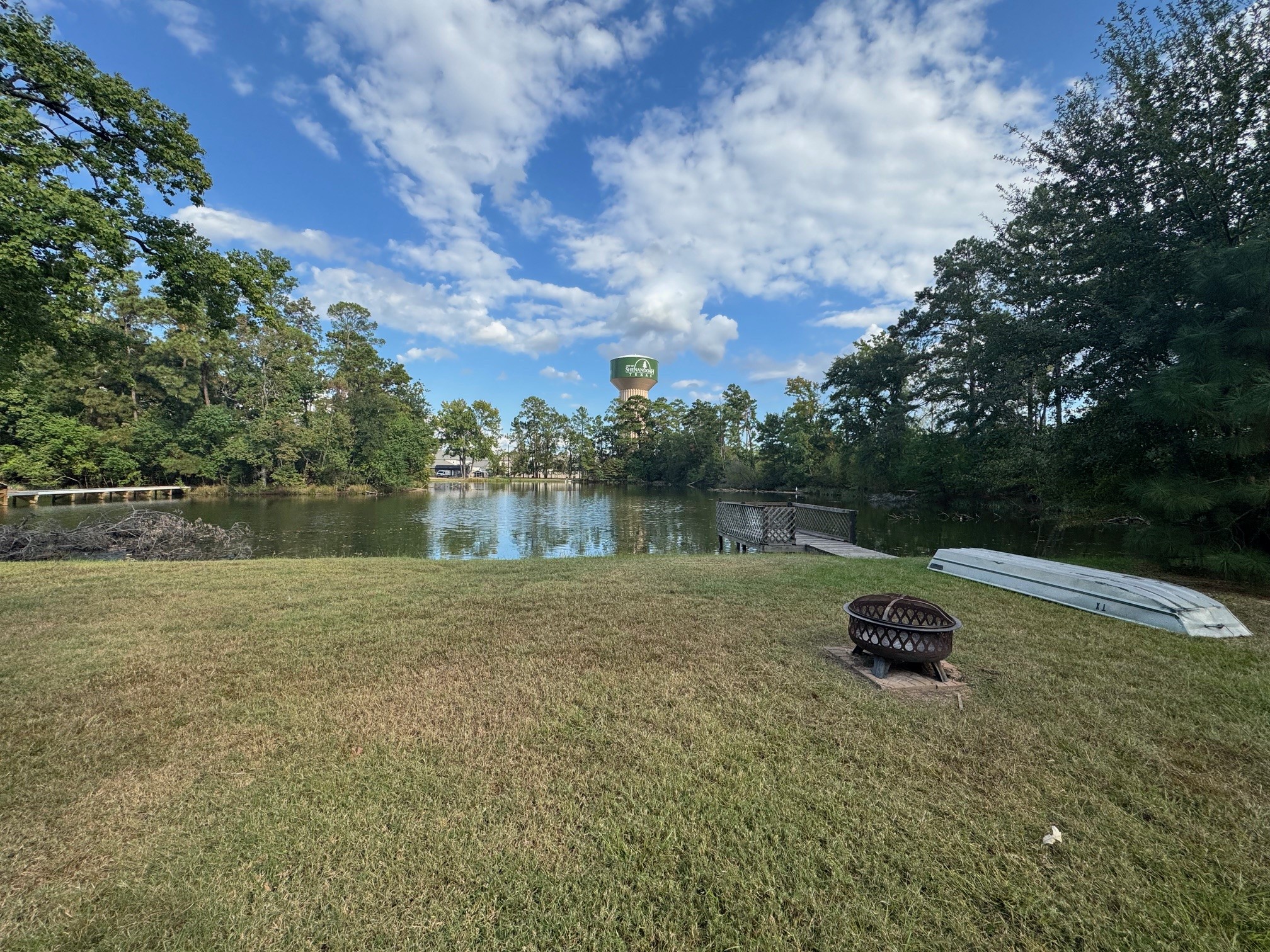 18121 Atkinson Lane Conroe, TX 77384 - Photo 28 of 29 a backyard of a house with lots of green space
