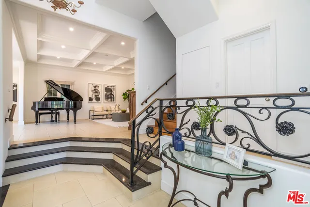 a view of a dining room with furniture and a wooden floor