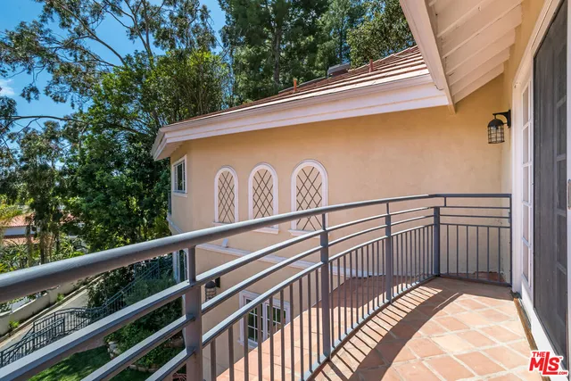 a bathroom with a sink mirror toilet and bathtub