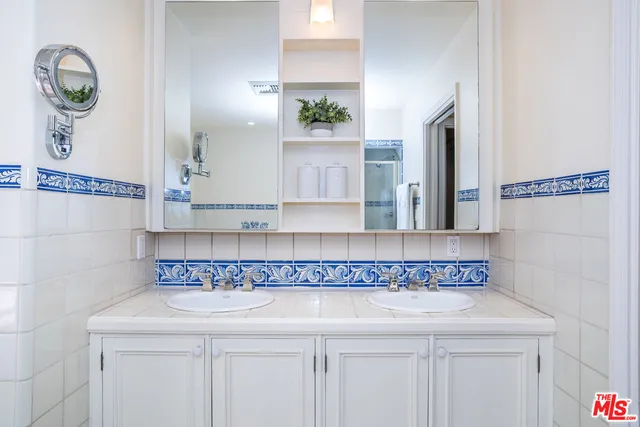 a bathroom with a shower and a toilet