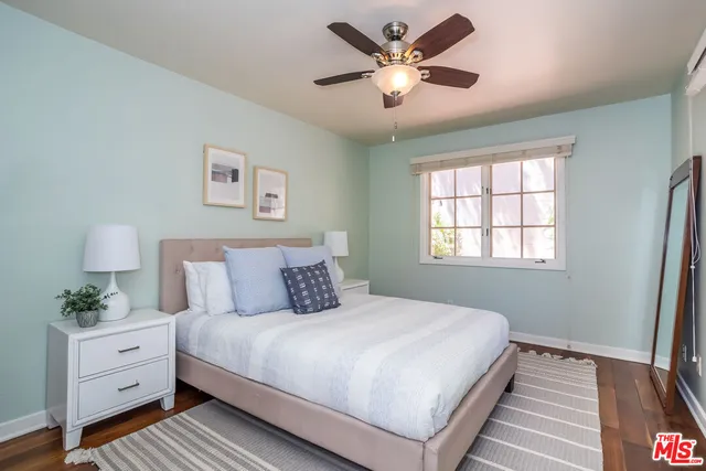 a kitchen with stainless steel appliances a sink stove and cabinets